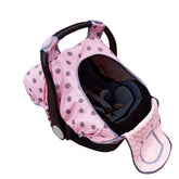 Dodo Nici carseat cover with pink dots on infant carrier for cozy warmth