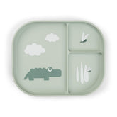 Done by Deer Foodie Croco plate green front view sparks mealtime curiosity.