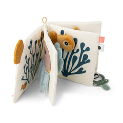 Done by Deer Sea Friends textured pages invite tactile discovery during tummy time.