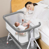 Donpemu baby bassinet bedside crib: easy setup beside parent bed for responsive night care.