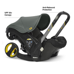 DOONA infant insert and head support maintaining newborn alignment