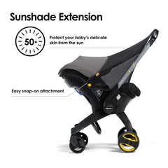 Doona Sunshade Extension attached to stroller enables quick shade during walks.