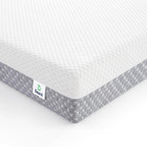 Dourxi mini crib mattress top view highlighting compact fit for portable cribs.