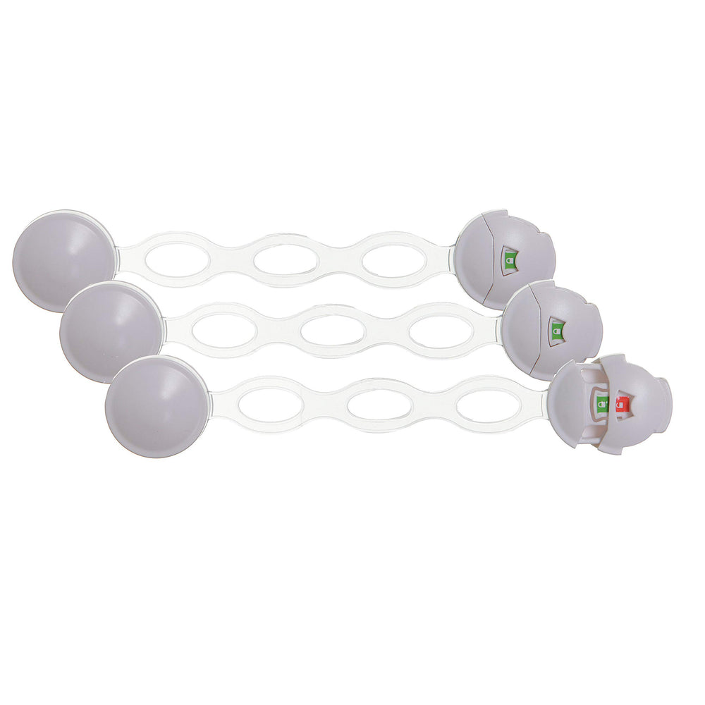 Dreambaby Ezy-Check latch close-up on cabinet for childproofing.