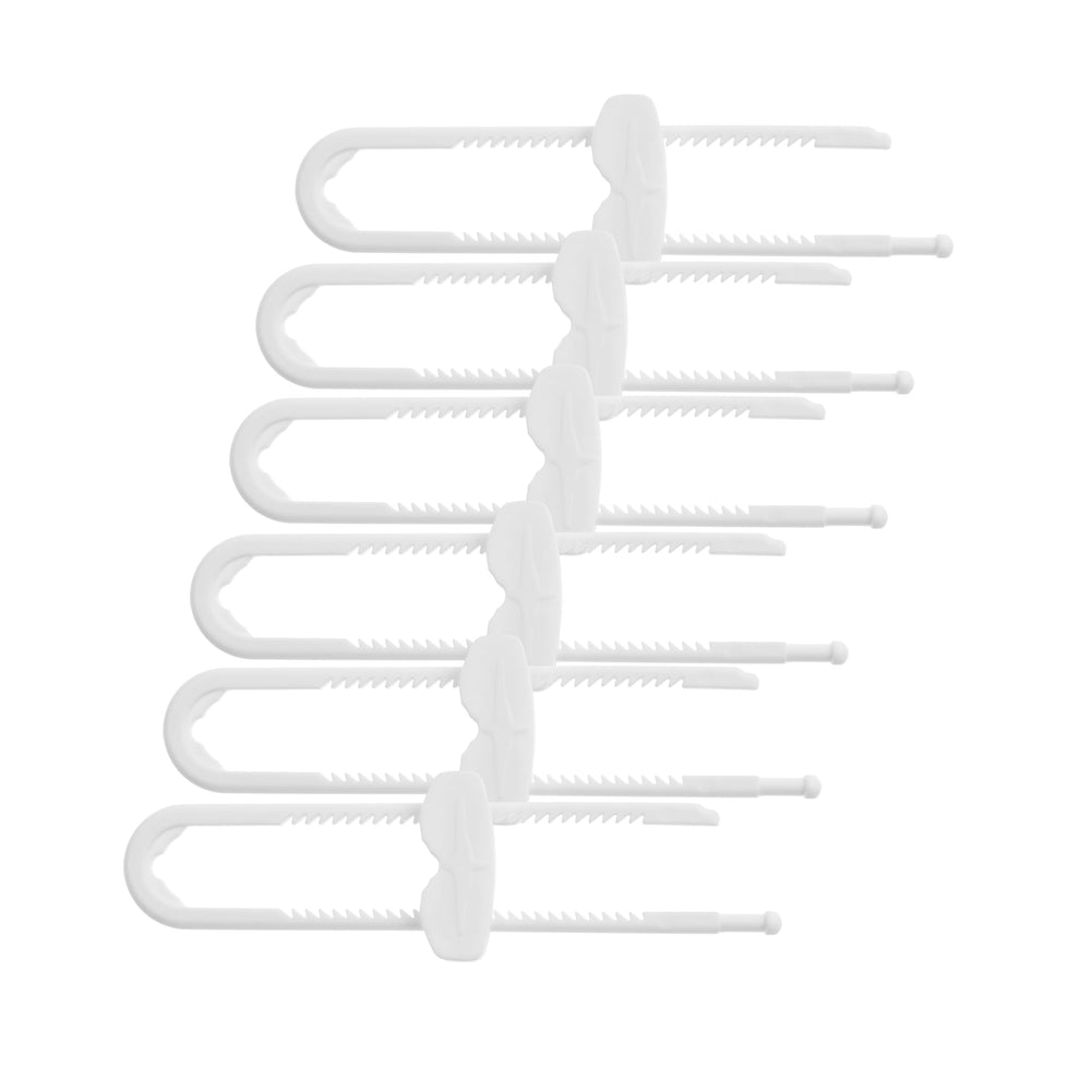 Dreambaby sliding locks on a white cabinet, keeping curious kids out