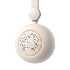 Dreamegg portable sound machine attached to a stroller for on-the-go soothing.
