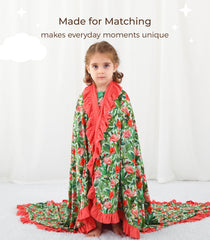 DREAMHALO Flamingo blanket in stroller demonstrates versatile travel companion for on-the-go comfort