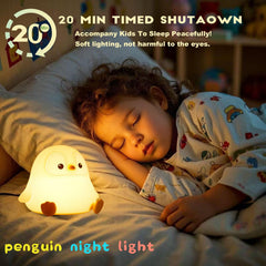DREAMING MY DREAM penguin night light on table, ideal for desk tasks with soft glow.
