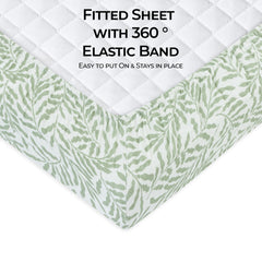 Dreamology Leaves muslin crib sheet folded to show soft cotton for sensitive skin