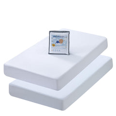 Dreamology mini crib protector close-up showing quilted top and soft texture for spills protection.