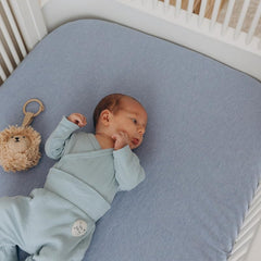 Dreamology mini-crib-sheets-soft close-up—ultra-soft cotton for cozy nursery moments.