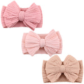 DRESHOW BQUBO headbands with nylon bows in closeup for soft newborn wear