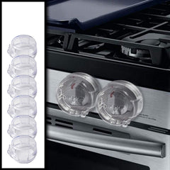 Driddle 6-pack clear stove knob safety covers installed on an oven knob for childproofing.