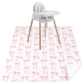 Drydiet Baby Splat Mat pink bow under high chair protects floors from spills.