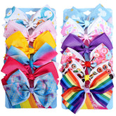 Dwenarry 12-pack rainbow heart bow with alligator clip secures toddler hair.
