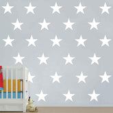 DXLING D399 white star decal close-up for nursery wall décor and playful ambiance.