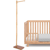 EBINGMIMA floor-standing crib arm main view; durable beech wood for nursery use.