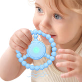 EccoDen vibrating teething toy with 3D textures soothes baby's gums during teething.