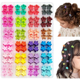 EleMirsa baby girl hair clips in organizer box for easy styling and storage.