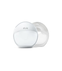 Elvie Curve wearable breast pump tucked in the bra for discreet hands-free milk expression.