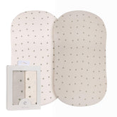 Ely's & Co bassinet sheets two-pack unboxed, showing soft jersey knit fabric gentle on baby's skin