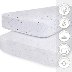 Ely's & Co. crib sheets show a snug 1.5 cm elastic fit for secure bedding.