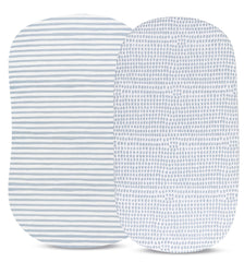 Elastic band on Ely's & Co sheet demonstrates secure, snug-fit for bassinet surfaces.
