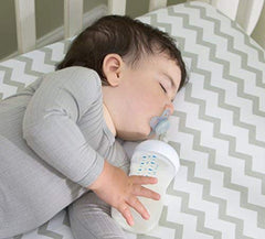 Ely's & Co machine-washable crib sheet ready for quick cleanup.