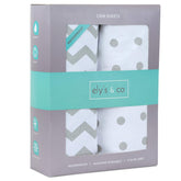 Ely's & Co waterproof crib sheet close-up shows elastic band for secure snug fit.