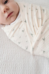 Ely's & Co sage bird swaddle full view emphasizes extra-large size for multipurpose baby care.