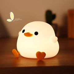 Emmanoth DoDo Duck Night Light on table provides a soft ambient glow for nurseries.