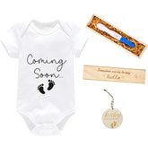ENERHOPE pregnancy announcement box opened, ready to share joyful news with family.