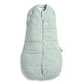 ergoPouch Cocoon Swaddle Sack 0.2 TOG Sage on baby for gentle arms-in transition.
