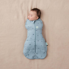 ergoPouch Cocoon Swaddle Dragonflies arms-in swaddle close-up showing startle reflex calm