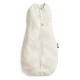ergoPouch cocoon-swaddle-sack-arm-in shows snug fit promoting calm newborn sleep.