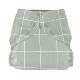 Esembly lattice outer front view demonstrating blowout protection and snug fit with adjustable snaps.