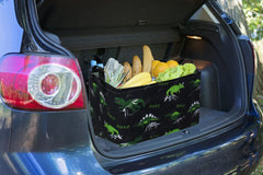 Essme dinosaur basket for kids room decor demonstrates collapsible storage when not in use.