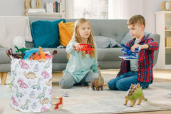 Essme Kids Dinosaur Laundry Basket collapsed for compact storage in small spaces.
