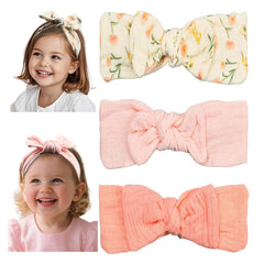 Esumun baby girl muslin headband with top knots, soft breathable fit for newborns.