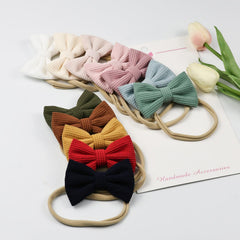 Esumun stretchy nylon headband provides comfortable one size fits all.