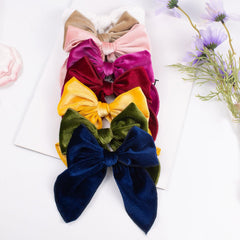 Esumun velvet bow close-up soft material ideal for infant photography props.