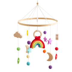 Etucdose crochet rainbow mobile on crib provides playful color and visual stimulation
