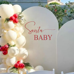 Eurteka Santa Baby Decal wall backdrop adds festive charm for holiday photos.