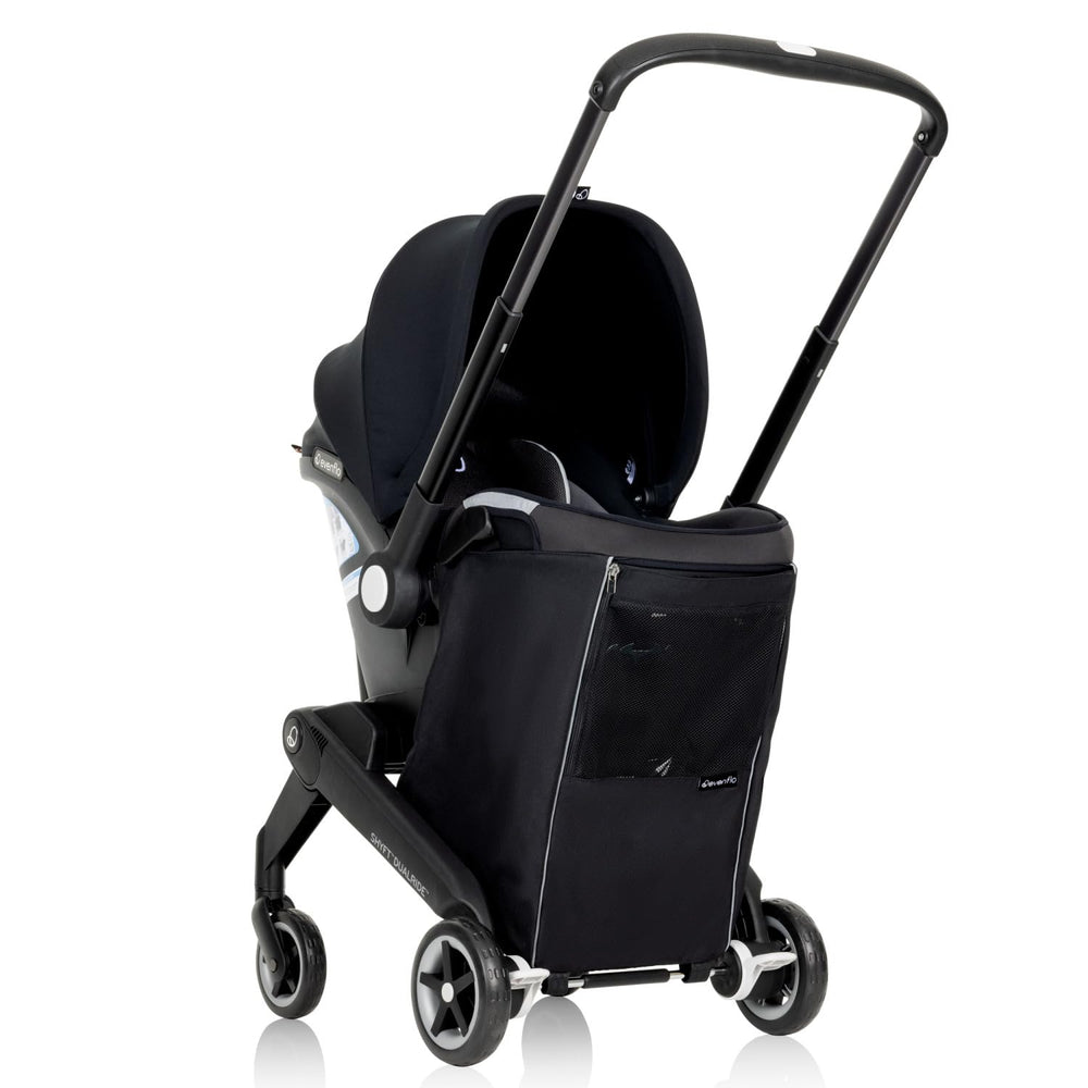 Evenflo Shyft DualRide Carryall front view with ample diaper storage for quick outings.