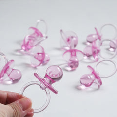 Evershine pink 2.5-inch pacifier on table decor setup for showers