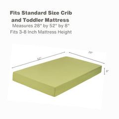 Everyday Kids green crib sheet on mattress demonstrates safe fit and breathable microfiber fabric.