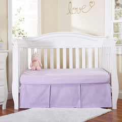 EVERYDAY KIDS Lavender crib skirt front view adds soft cotton detail for a cozy nursery.