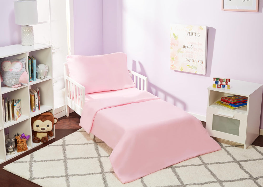 EVERYDAY KIDS solid pink comforter close-up showing soft brushed microfiber for cozy nights