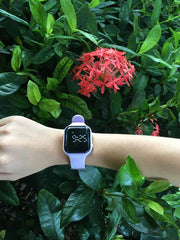 e-vibra water-resistant wristband near the charging port highlighting daily wear durability