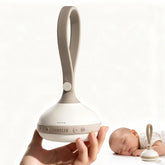 Evoceler portable white noise device shown in travel setup for peaceful naps